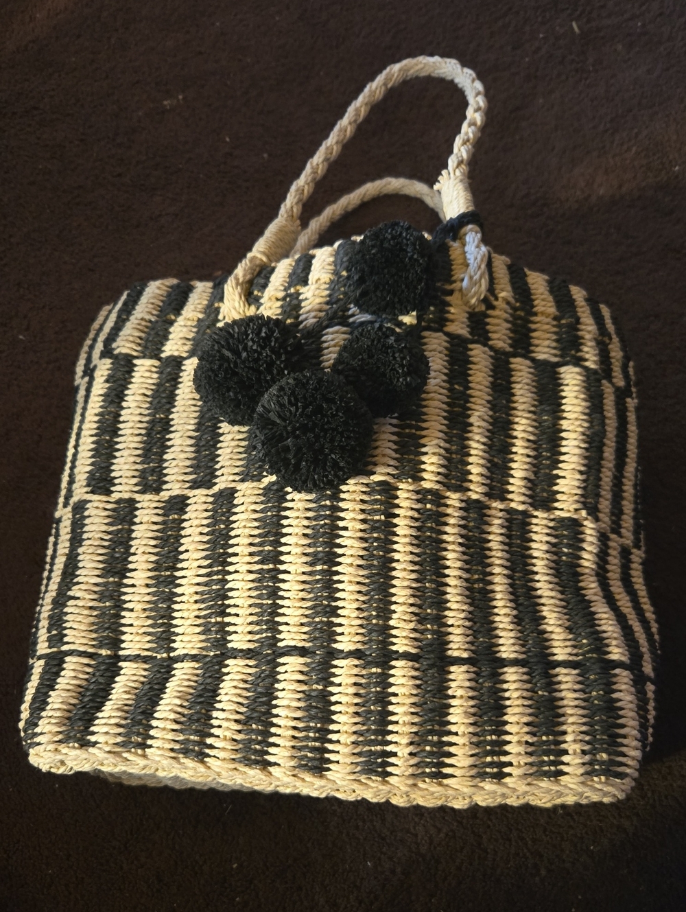 Black and Natural Woven Straw Tote with Pom-Pom Detail